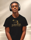 Teen wearing the black Beyond the Label Gold Crown tee with headphones